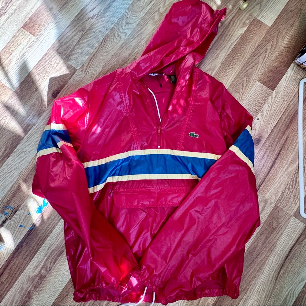 Vintage 70’s Lacoste Nylon Hooded Red Qtr Zip with Yellow and Blue Accents.